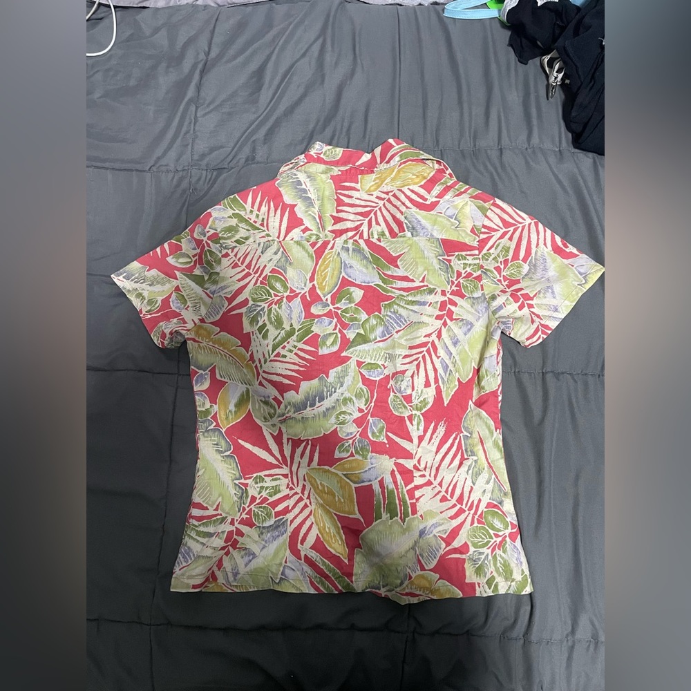 This is a Hawaiian button down shirt. - Picture 2 of 4